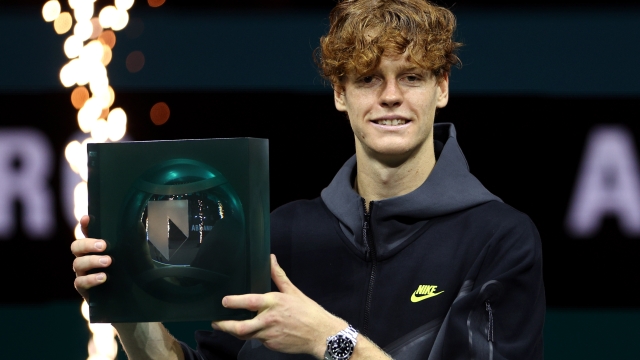 ROTTERDAM, NETHERLANDS - FEBRUARY 18:  Jannik Sinner of Italy celebrates with the trophy after victory against Alex de Minaur of Australia during their Men Singles Final match on day 7 of the ABN AMRO Open at Rotterdam Ahoy on February 18, 2024 in Rotterdam, Netherlands.  (Photo by Dean Mouhtaropoulos/Getty Images)