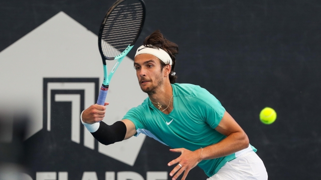 epa11068718 Lorenzo Musetti of Italy in action against Alexander Bublik of Kazakhstan during a quarterfinal match of the 2024 Adelaide International at Memorial Drive Tennis Centre in Adelaide, Australia, 11 January 2024.  EPA/MATT TURNER AUSTRALIA AND NEW ZEALAND OUT
