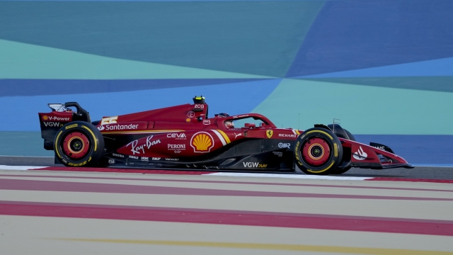 Ferrari driver Carlos Sainz of Spain steers his car for a Formula One pre season test at the Bahrain International Circuit in Sakhir, Bahrain, Wednesday, Feb. 21, 2024. (AP Photo/Darko Bandic)
