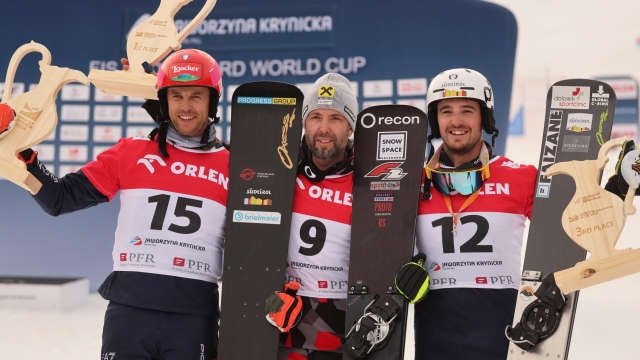 epa11177485 (L-R) Second placed Roland Fischnaller of Italy, winner Andreas Prommegger of Austria and third placed Daniele Bagozza of Italy celebrate on the podium after the men's Snowboard Parallel Slalom at the FIS World Cup, in Krynica-Zdroj, Poland, 24 February 2024.  EPA/Grzegorz Momot POLAND OUT