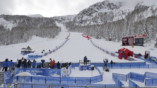 A view of the finish area as an alpine ski, women's World Cup super G race, was cancelled due to the excess of snow in Val di Fassa, Italy, Saturday, Feb. 24, 2024. (AP Photo/Marco Trovati)