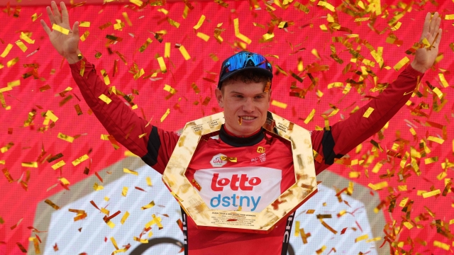 Lotto-DSTNY's Belgian cyclist Lennert Van Eetvelt celebrates after winning the race of the 6th UAE Cycling Tour on February 25, 2024. (Photo by Giuseppe CACACE / AFP)