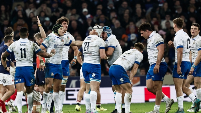 Italy's players react at the end of the Six Nations rugby union international match between France and Italy at Stade Pierre Mauroy in Villeneuve-d'Ascq, near Lille, northern France, on February 25, 2024. (Photo by Sameer Al-Doumy / AFP)