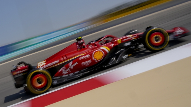 Ferrari driver Carlos Sainz of Spain steers his car for a Formula One pre season test at the Bahrain International Circuit in Sakhir, Bahrain, Friday, Feb. 23, 2024. (AP Photo/Darko Bandic)