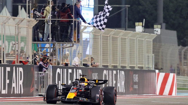 Red Bull Racing's Dutch driver Max Verstappen crosses the finish line to win the Bahrain Formula One Grand Prix at the Bahrain International Circuit in Sakhir on March 2, 2024. (Photo by Giuseppe CACACE / AFP)