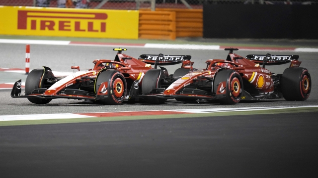 Ferrari driver Carlos Sainz of Spain and Ferrari driver Charles Leclerc of Monaco steer their cars during the Formula One Bahrain Grand Prix at the Bahrain International Circuit in Sakhir, Bahrain, Saturday, March 2, 2024. (AP Photo/Darko Bandic)