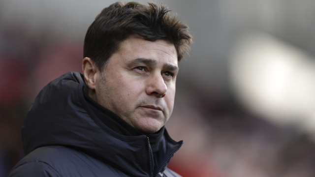 Chelsea's head coach Mauricio Pochettino waits for the start of an English Premier League soccer match between Brentford and Chelsea at the Gtech Community Stadium in London , Saturday, March 2, 2024. (AP Photo/Ian Walton)