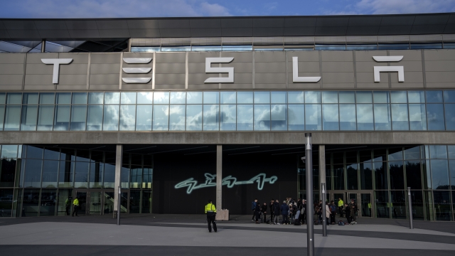 A general view of the Tesla Gigafactory for electric cars in Gruenheide near Berlin, Germany, Tuesday, March 5, 2024. Production at Tesla's electric vehicle plant in Germany came to a standstill and workers were evacuated after a power outage that officials suspect was caused by arson. The interior ministry in the state of Brandenburg says unidentified people are suspected of deliberately setting fire to a high-voltage transmission line on a power pylon. (AP Photo/Ebrahim Noroozi)