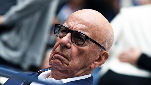 (FILES) Rupert Murdoch arrives to watch the 2017 US Open Men's Singles final match between Spain's Rafael Nadal and South Africa's Kevin Anderson, at the USTA Billie Jean King National Tennis Center in New York on September 10, 2017. Media magnate Rupert Murdoch announced March 7, 2024 that he plans to wed his girlfriend, Elena Zhukova, in June, The New York Times reported. (Photo by Jewel SAMAD / AFP)