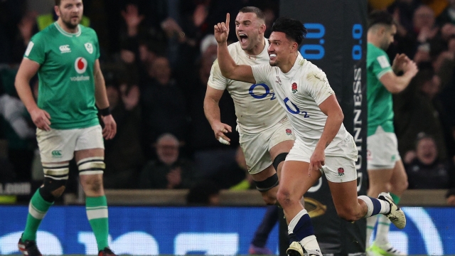 England's Marcus Smith celebrates scoring the winning drop goal during the Six Nations international rugby union match between England and Ireland at Twickenham Stadium in south-west London, on March 9, 2024. (Photo by Adrian DENNIS / AFP)