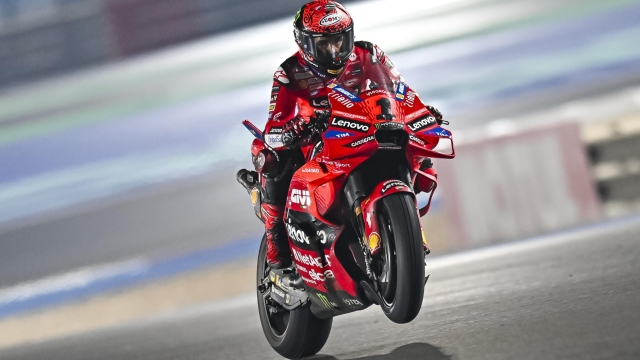 epa11207526 Italian MotoGP rider Francesco Bagnaia of Ducati Lenovo Team in action during a practice session of the Motorcycling Grand Prix of Qatar at the Losail International Circuit in Doha, Qatar, 08 March 2024. The season-opening 2024 Motorcycling Grand Prix of Qatar will be held on 10 March.  EPA/NOUSHAD THEKKAYIL
