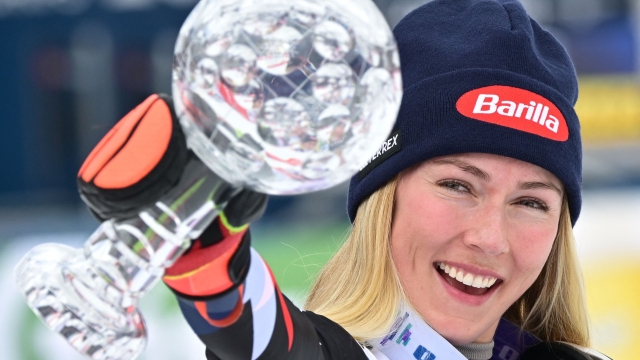 Winner USA's Mikaela Shiffrin celebrates the trophy after the women's Slalom event of FIS Ski Alpine World Cup in Saalbach, Austria on March 16, 2024. (Photo by Joe Klamar / AFP)