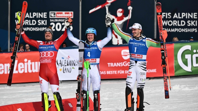 (L-R) Second placed Austria's Manuel Feller, winner Norway's Timon Haugan and third placed Germany's Linus Strasser celebrate after the men's Slalom event of FIS Ski Alpine World Cup in Saalbach, Austria on March 17, 2024. (Photo by Joe Klamar / AFP)