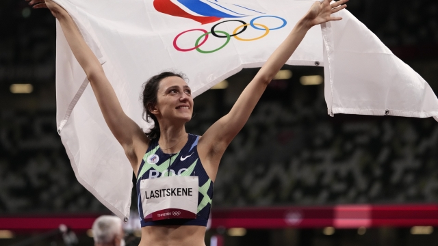 FILE - Mariya Lasitskene, of Russian Olympic Committee, reacts after winning the women's high jump final at the 2020 Summer Olympics, Saturday, Aug. 7, 2021, in Tokyo. Track and field leaders signaled Thursday, March 23, 2023, that it will be nearly impossible for Russian and Belarusian athletes to compete at the Paris Olympics next year if the war in Ukraine continues.(AP Photo/Charlie Riedel, File)