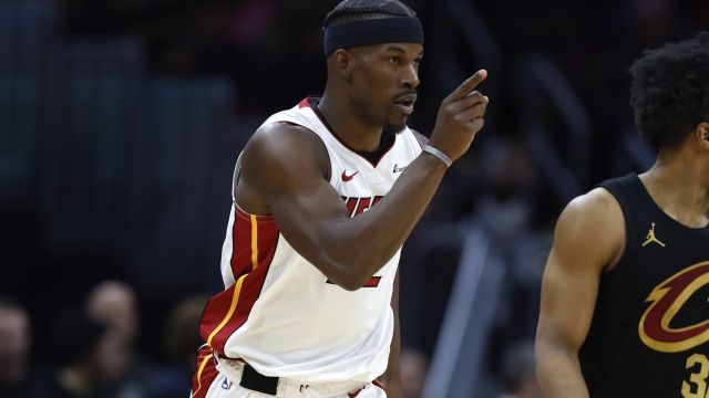 Miami Heat forward Jimmy Butler celebrates after making a basket against the Cleveland Cavaliers during the second half of an NBA basketball game, Wednesday, March 20, 2024, in Cleveland. (AP Photo/Ron Schwane)