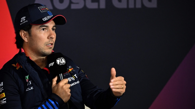 Red Bull Racing's Mexican driver Sergio Perez attends a press conference at the Albert Park Circuit ahead of the Formula One Australian Grand Prix in Melbourne on March 21, 2024. (Photo by Paul Crock / AFP) / -- IMAGE RESTRICTED TO EDITORIAL USE - STRICTLY NO COMMERCIAL USE --