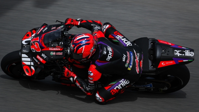 epa11238920 Maverick Vinales of Spain and Aprilia Racing in action during the qualifying session of the Motorcycling Grand Prix of Portugal, in Portimao, Portugal, 23 March 2024. The 2024 Motorcycling Grand Prix of Portugal is held on 24 March.  EPA/JOSE SENA GOULAO