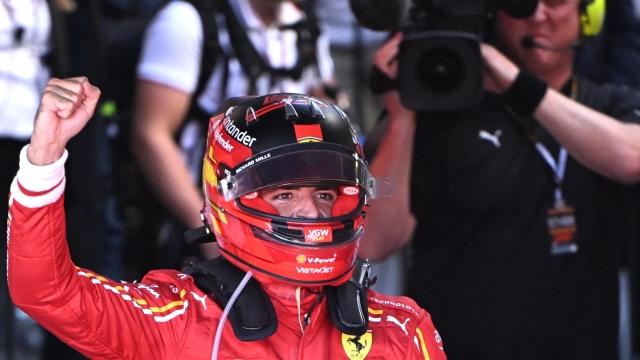 epa11240543 Carlos Sainz of Ferrari celebrates winning the Australian Grand Prix 2024 at Albert Park Circuit in Melbourne, Australia 24 March 2024.  EPA/JOEL CARRETT AUSTRALIA AND NEW ZEALAND OUT