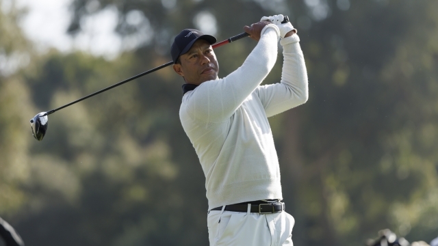 Tiger Woods warms up on the second hole during the first round of the Genesis Invitational golf tournament at Riviera Country Club, Thursday, Feb. 15, 2024, in the Pacific Palisades area of Los Angeles. (AP Photo/Ryan Kang)