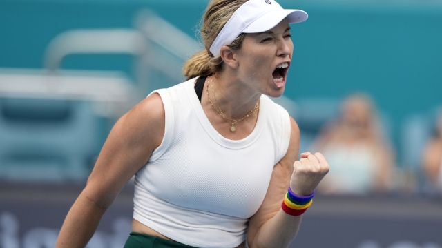 Danielle Collins reacts after winning a point against Caroline Garcia, of France, during the Miami Open tennis tournament, Wednesday, March 27, 2024, in Miami Gardens, Fla. (AP Photo/Lynne Sladky)