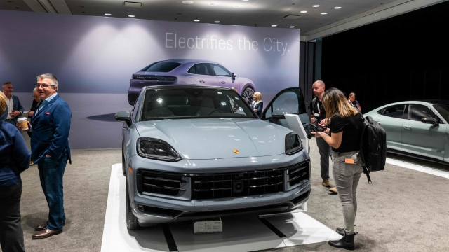 NEW YORK, NEW YORK - MARCH 27: The new electric Porsche Macan is displayed at the New York International Auto Show on March 27, 2024 in New York City. The annual show, which opens to the public on March 29th, is one of the largest auto shows in the world and reveals numerous new car models for both the public and the media. This year's show includes an emphasis on new electric and hybrid models.   Spencer Platt/Getty Images/AFP (Photo by SPENCER PLATT / GETTY IMAGES NORTH AMERICA / Getty Images via AFP)