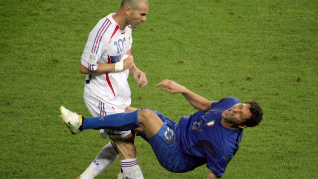 FILES - A photo taken 09 July 2006 shows French midfielder Zinedine Zidane (L) gesturing after head-butting Italian defender Marco Materazzi during the World Cup 2006 final football match between Italy and France at Berlins Olympic Stadium. Materazzi said in an interview in German sports magazine "Sports Bild" published 01August 2007 that he has tried several times to arrange a meeting with Zinedine Zidane, but the Frenchman who head-butted him in the 2006 World Cup final has always refused to meet him. AFP PHOTO  JOHN MACDOUGALL