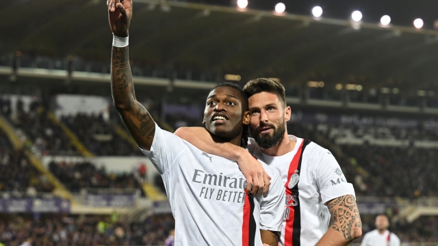 FLORENCE, ITALY - MARCH 30: Rafael Leao of AC Milan celebrates with Olivier Giroud after scoring the team's second goal during the Serie A TIM match between ACF Fiorentina and AC Milan - Serie A TIM  at Stadio Artemio Franchi on March 30, 2024 in Florence, Italy. (Photo by Claudio Villa/AC Milan via Getty Images) (Photo by Claudio Villa/AC Milan via Getty Images)