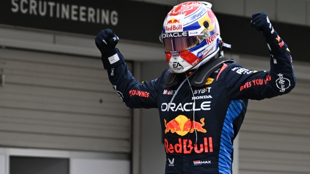 TOPSHOT - Red Bull Racing's Dutch driver Max Verstappen celebrates winning the Formula One Japanese Grand Prix race at the Suzuka circuit in Suzuka, Mie prefecture on April 7, 2024. (Photo by Philip FONG / AFP)