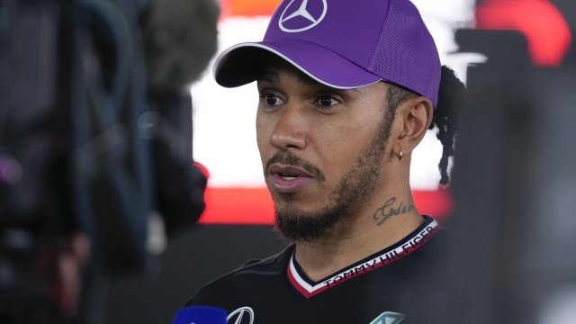 Mercedes driver Lewis Hamilton of Britain talks to reporters after the qualifying session at the Suzuka Circuit in Suzuka, central Japan, Saturday, April 6, 2024, ahead of Sunday's Japanese Formula One Grand Prix. (AP Photo/Hiro Komae)