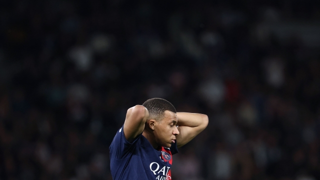 Paris Saint-Germain's French forward #07 Kylian Mbappe reacts after missing a goal opportunity  during the French L1 football match between Paris Saint-Germain (PSG) and Clermont Foot 63 at the Parc des Princes stadium in Paris on April 6, 2024. (Photo by FRANCK FIFE / AFP)