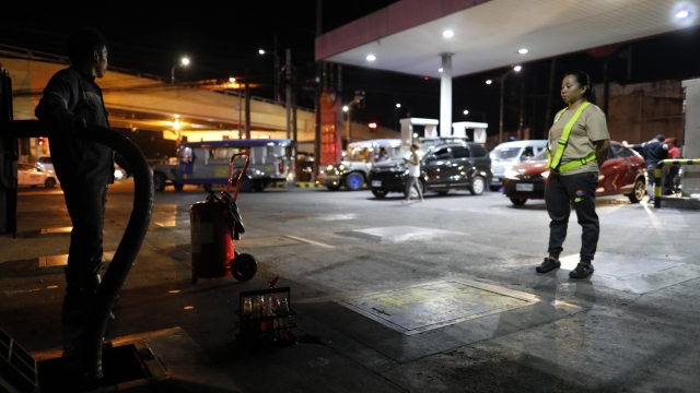 epa11129448 A laborer delivers diesel as fuel prices are expected to rise, at a station in Manila, Philippines, 05 February 2024. Motorists in the Philippines will see another increase of petroleum products prices effective from 06 February, which the Philippines' Department of Energy Oil Industry Management Bureau said was due to disruption of supplies and proposed extension of the Organization of the Petroleum Exporting Countries (OPEC) cuts by 2.2 million barrels per day until the first quarter of 2024.  EPA/FRANCIS R. MALASIG