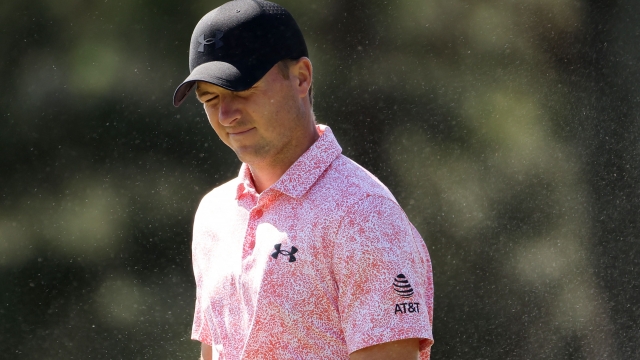 AUGUSTA, GEORGIA - APRIL 12: Jordan Spieth of the United States closes his eyes as sand is blown into his face on the 17th green during the second round of the 2024 Masters Tournament at Augusta National Golf Club on April 12, 2024 in Augusta, Georgia.   Jamie Squire/Getty Images/AFP (Photo by Jamie Squire/Getty Images) (Photo by JAMIE SQUIRE / GETTY IMAGES NORTH AMERICA / Getty Images via AFP)