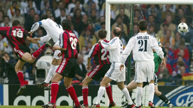 Bayer Leverkusen's Lucio, left, scores his sides equalising goal to make the score 1-1 during the UEFA Champions League final against Real Madrid at Hampden Park in Glasgow, Scotland Wednesday May 15, 2002. (AP Photo/Frank Augstein)
