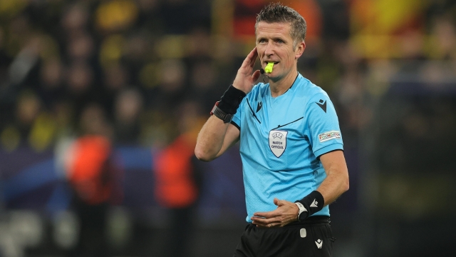 epa11218992 Referee Daniele Orsato reacts during the UEFA Champions League Round of 16, 2nd leg soccer match between Borussia Dortmund and PSV Eindhoven, in Dortmund, Germany, 13 March 2024.  EPA/FRIEDEMANN VOGEL