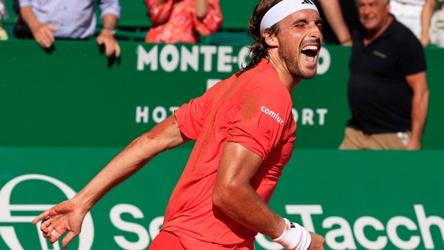 TOPSHOT - Greece's Stefanos Tsitsipas celebrates after winning at the end of his Monte Carlo ATP Masters Series Tournament final tennis match against Norway's Casper Ruud on the Rainier III court at the Monte Carlo Country Club on April 14, 2024. (Photo by Valery HACHE / AFP)