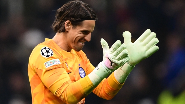 Inter Milan's Swiss goalkeeper #01 Yann Sommer celebrates during the UEFA Champions League last 16 first leg football match Inter Milan vs Atletico Madrid at the San Siro stadium in Milan on February 20, 2024. (Photo by Marco BERTORELLO / AFP)