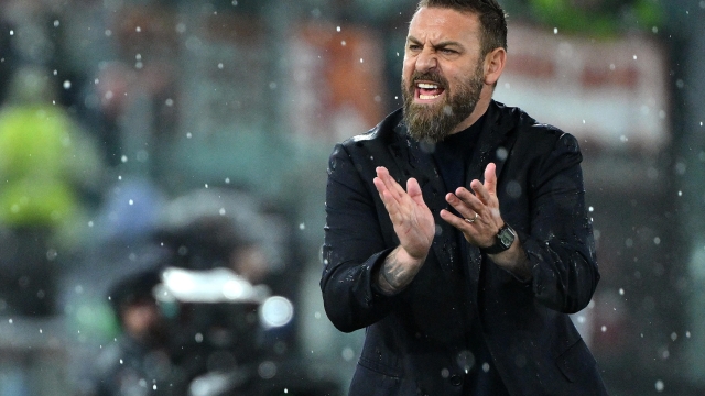 AS Roma's head coach Daniele De Rossi reacts during the UEFA Europe League quarter final second leg soccer match between AS Roma and AC Milan at Olimpico stadium in Rome, Italy, 18 April 2024.  ANSA/ETTORE FERRARI