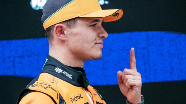 epa11288011 McLaren driver Lando Norris of Britain poses after claiming pole position in the Sprint Qualifying ahead of the Formula One Chinese Grand Prix, in Shanghai, China, 19 April 2024. The 2024 Formula 1 Chinese Grand Prix is held at the Shanghai International Circuit racetrack on 21 April after a five-year hiatus.  EPA/ALEX PLAVEVSKI
