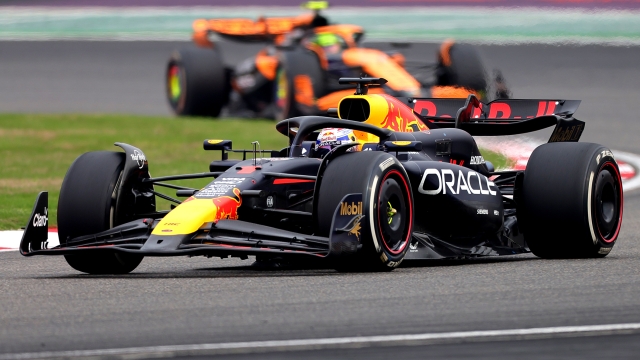 SHANGHAI, CHINA - APRIL 21: Max Verstappen of the Netherlands driving the (1) Oracle Red Bull Racing RB20 leads Lando Norris of Great Britain driving the (4) McLaren MCL38 Mercedes on track during the F1 Grand Prix of China at Shanghai International Circuit on April 21, 2024 in Shanghai, China. (Photo by Lintao Zhang/Getty Images )