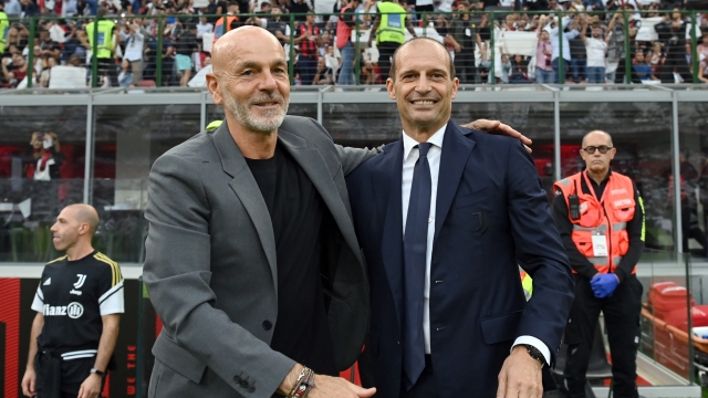 MILAN, ITALY - OCTOBER 08: Head coach AC Milan Stefano Pioli greets head coach Juventus Massimiliano Allegri before the Serie A match between AC Milan and Juventus at Stadio Giuseppe Meazza on October 08, 2022 in Milan, Italy. (Photo by Claudio Villa/AC Milan via Getty Images)
