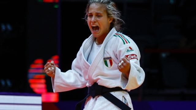 Italy's Odette Giuffrida reacts as she competes with Kosovo's Distria Krasniqi (not pictured) during their women's -52Kg bronze medal bout at the World Judo Championships in Doha on May 8, 2023. (Photo by KARIM JAAFAR / AFP)
