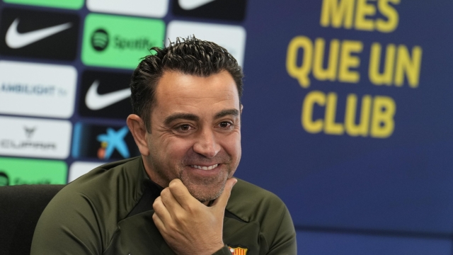 epa11299839 FC Barcelona's head coach Xavi Hernandez attends a press conference held at Joan Gamper Sports City in Barcelona, Catalonia, Spain, 25 April 2024. Hernandez reversed his decision to leave the club at the end of the season and continue as head coach of the Spanish LaLiga club until 2025.  EPA/Alejandro García