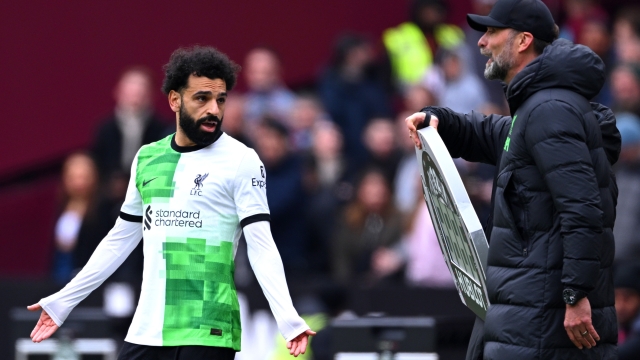 LONDON, ENGLAND - APRIL 27: Mohamed Salah of Liverpool clashes with Jurgen Klopp, Manager of Liverpool, during the Premier League match between West Ham United and Liverpool FC at London Stadium on April 27, 2024 in London, England. (Photo by Justin Setterfield/Getty Images)