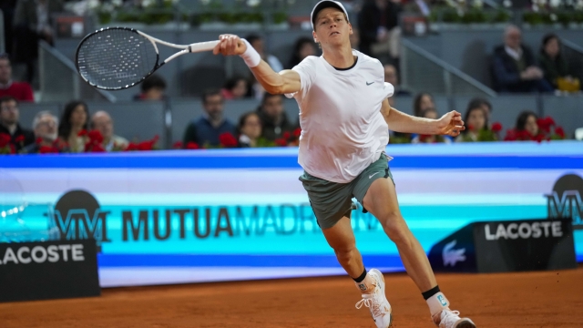 Jannik Sinner, of Italy, returns the ball to Lorenzo Sonego, of Italy, during the Mutua Madrid Open tennis tournament in Madrid, Saturday, April 27, 2024. (AP Photo/Manu Fernandez)