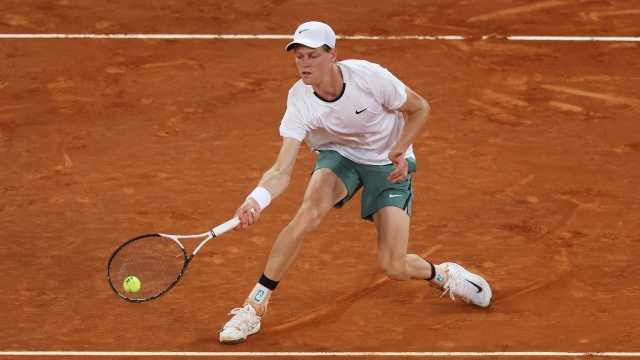 MADRID, SPAIN - APRIL 29: Jannik Sinner of Italy plays a forehand against Pavel Kotov of Russia during their Men's Round of 32 match during day seven of the Mutua Madrid Open at La Caja Magica on April 29, 2024 in Madrid, Spain. (Photo by Julian Finney/Getty Images)