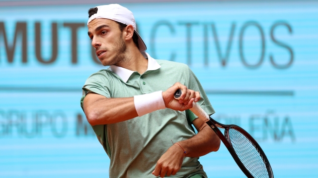 MADRID, SPAIN - APRIL 30: Francisco Cerundolo of Argentina plays a forehand against Alexander Zverev of Germany during their Men's Round of 16 match on day eight of the Mutua Madrid Open at La Caja Magica on April 30, 2024 in Madrid, Spain.  (Photo by Clive Brunskill/Getty Images)