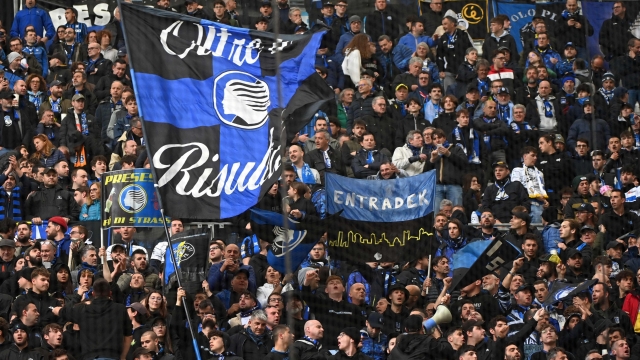 Atalanta supporters sing in the stands ahead of the UEFA Europa League semi-final first leg football match between Olympique de Marseille (OM) and Atalanta at the Stade Velodrome in Marseille, southern France, on May 2, 2024. (Photo by Sylvain THOMAS / AFP)