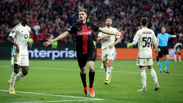 LEVERKUSEN, GERMANY - MAY 09: Josip Stanisic of Bayer Leverkusen celebrates scoring his team's second goal during the UEFA Europa League 2023/24 Semi-Final second leg match between Bayer 04 Leverkusen and AS Roma at BayArena on May 09, 2024 in Leverkusen, Germany. (Photo by Alex Grimm/Getty Images)