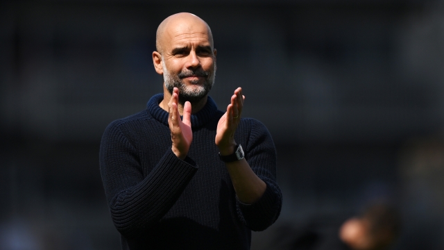 LONDON, ENGLAND - MAY 11: Pep Guardiola, Manager of Manchester City, acknowledges the fans following the Premier League match between Fulham FC and Manchester City at Craven Cottage on May 11, 2024 in London, England. (Photo by Justin Setterfield/Getty Images)