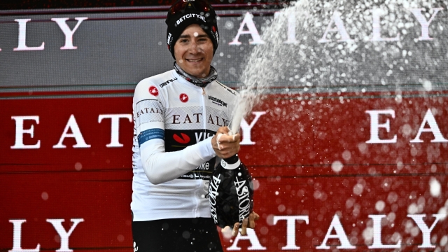 Belgian rider Cian Uijtdebroeks of Visma Lease a Bike wearing the best young rider's white jersey celebrate on the podium after 10th stage of the 107 Giro d'Italia 2024, cycling race over 142 km from Pompei to Cusano Mutri, Italy, 14 May 2024. ANSA/LUCA ZENNARO
